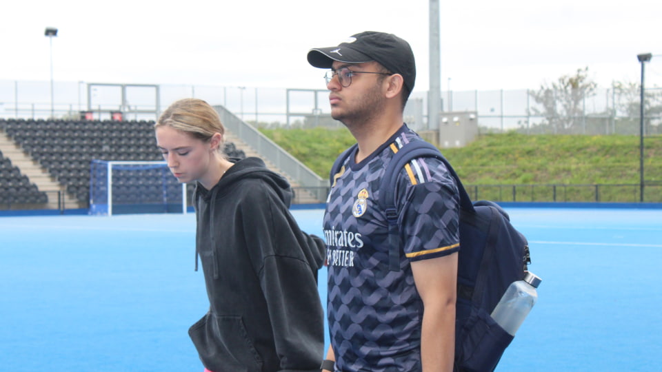 Image of students at the hockey pitch