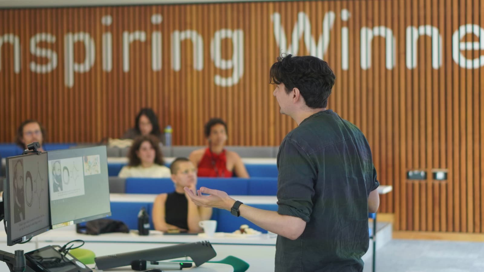 person talking at the FLUX event