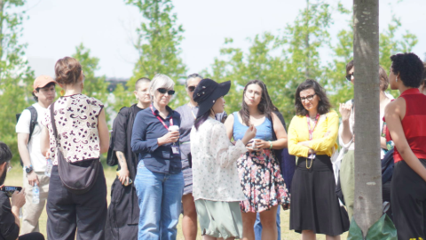 People stood outside in the park