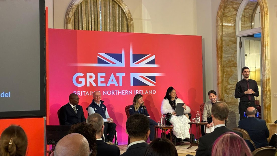 A picture of panellists talking to an audience