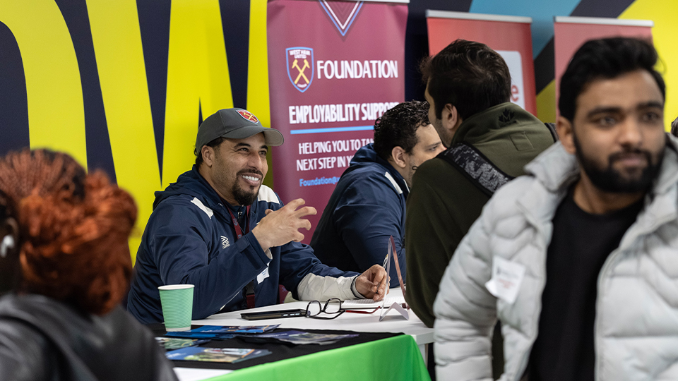 Two people talking at the Here East Student Job fair