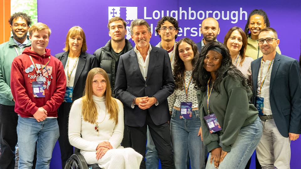 Lord Sebastian Coe photographed with Loughborough University London students