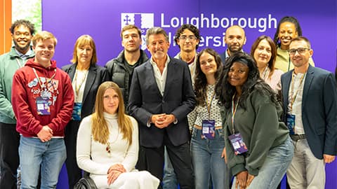 Lord Sebastian Coe photographed with Loughborough University London students